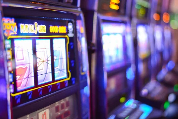 Yggdrasil slot game interface on mobile phone showing reel layout and bonus feature